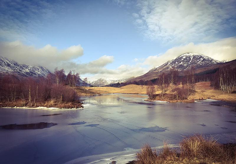 mountain scene with loch in the scottish highlands