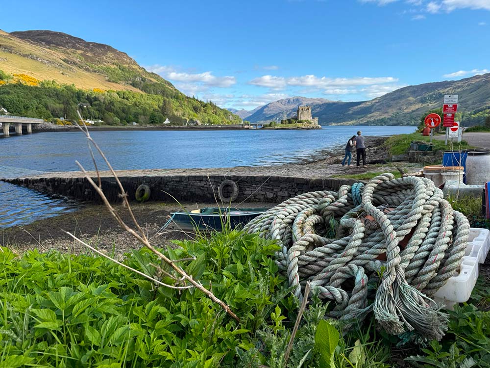 loch with eilean donan castle in the distance